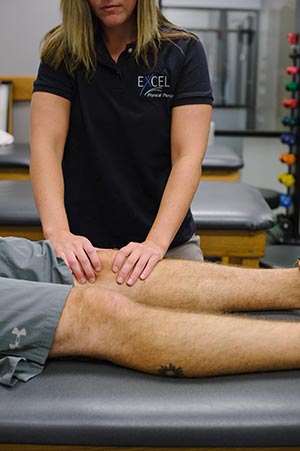 Physical therapist with client